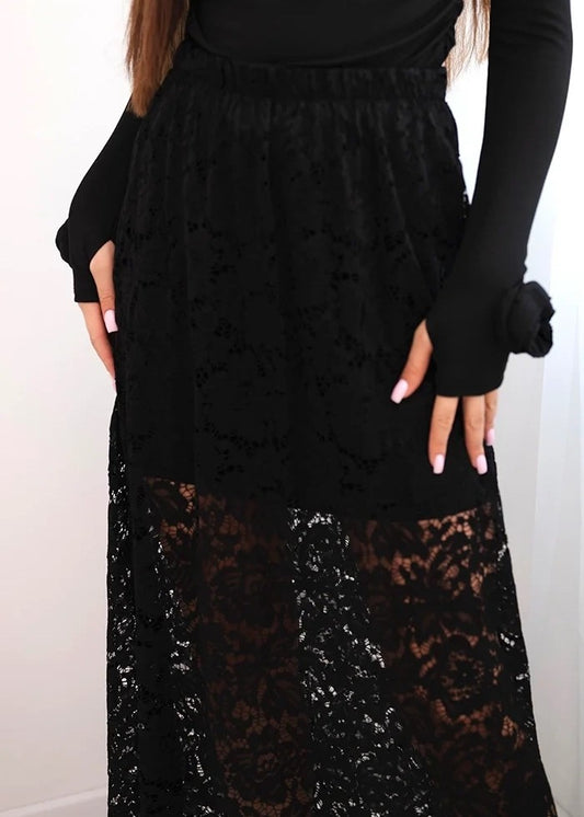 melni svārki ar mežģīnēm