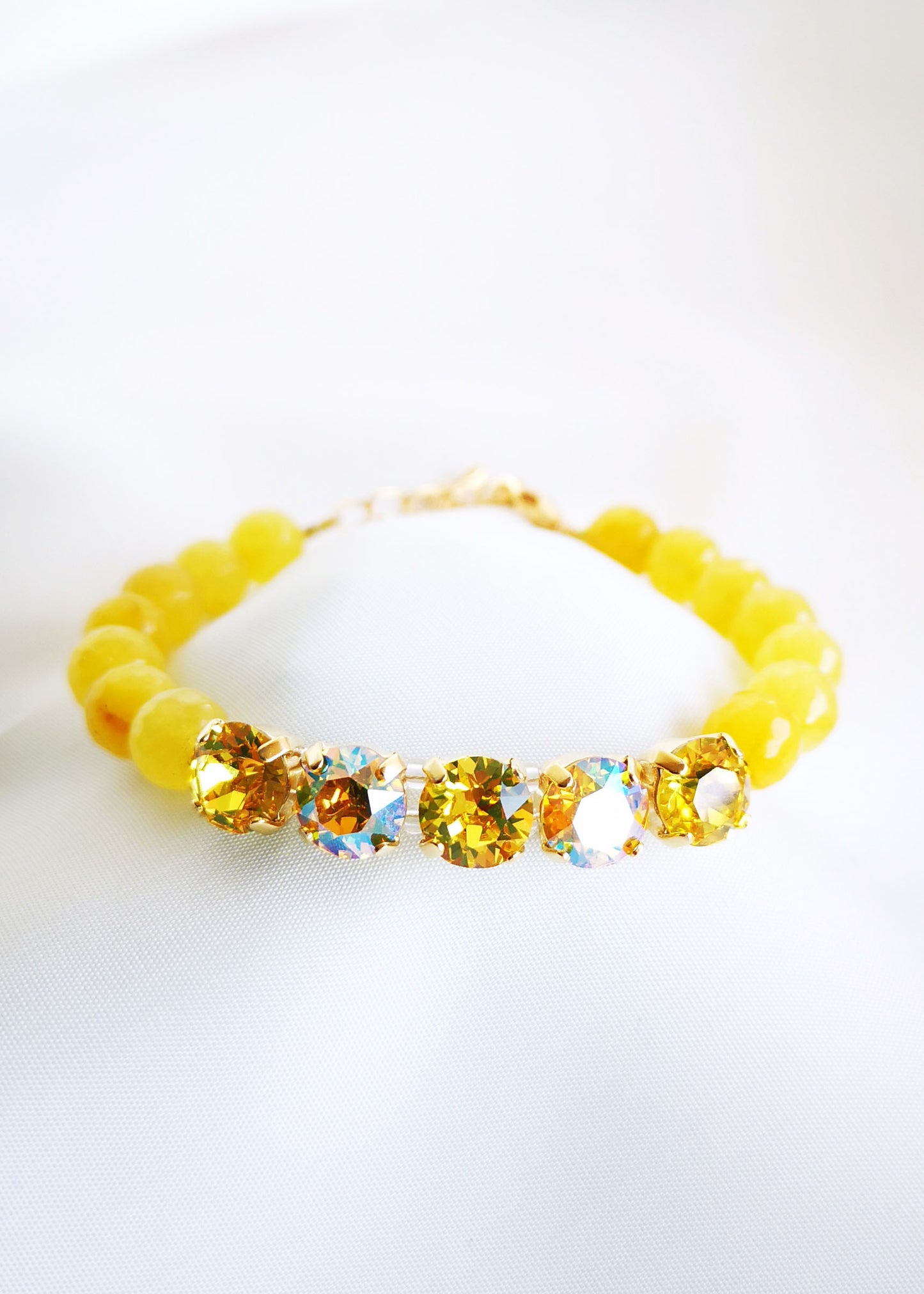 Dzeltena ahāta rokassprādze ar 5 kristāliem