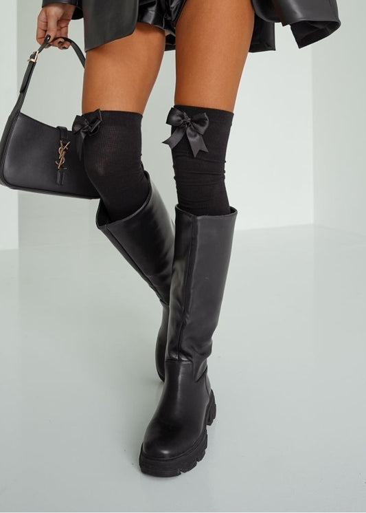 melnas garās zeķes ar bantīti